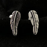 Silver feather design stud earrings