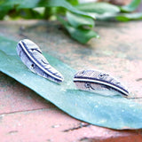 Silver feather design stud earrings