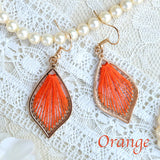 One color mandala design threaded earrings.